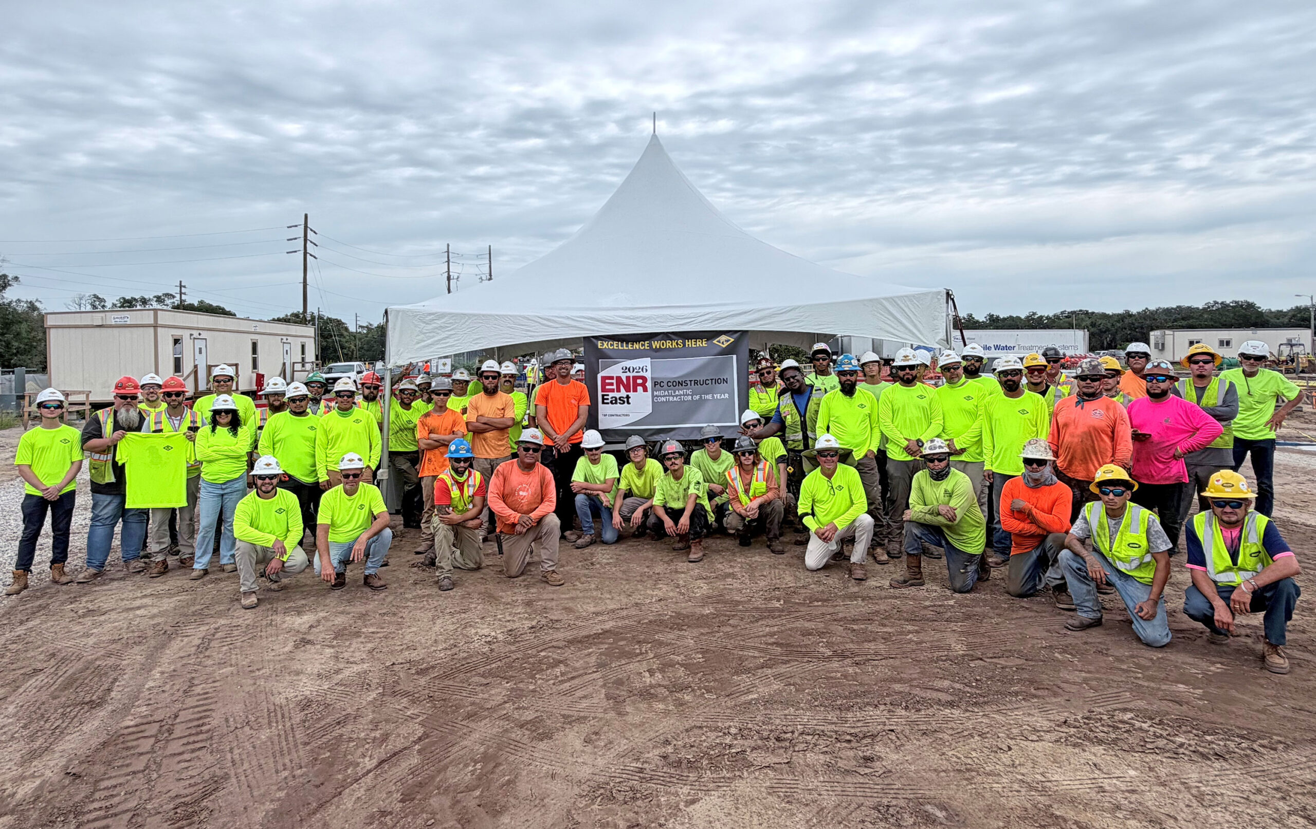 Team celebrating the 2026 ENR Mid-Atlantic Contractor of the Year Honor